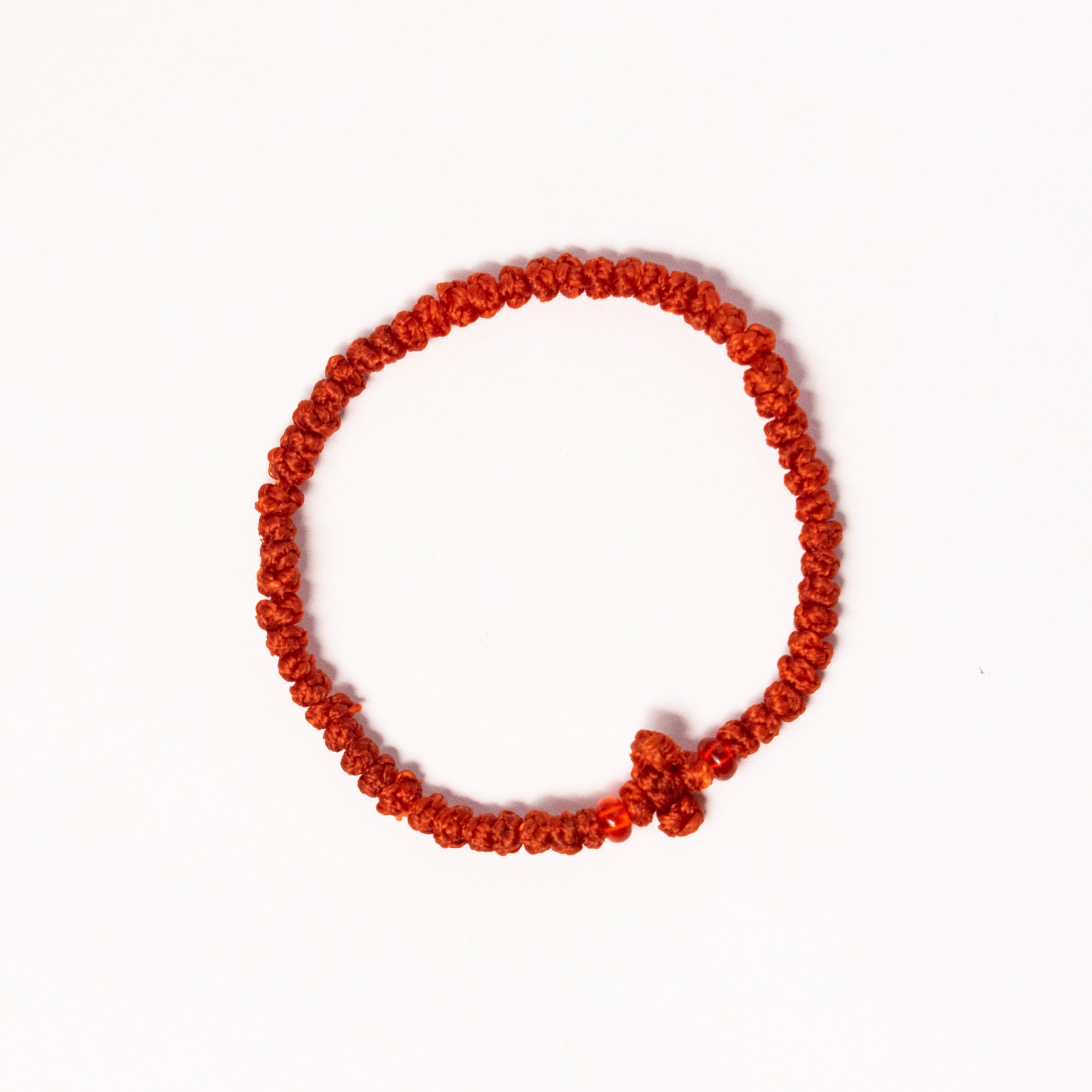 Brățară Roșie Împletită – Simbol al Protecției și Norocului